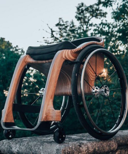 paul de livron crafts wooden wheelchair for the pope with burnt oak beams from notre-dame