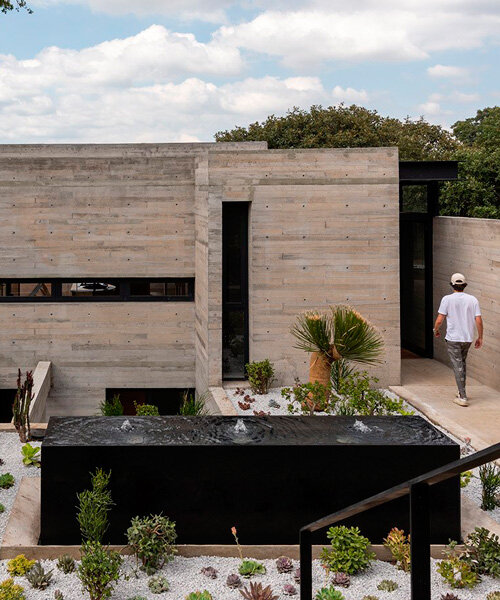 four intertwined levels extend ayg house's living zones towards greenery in mexico city