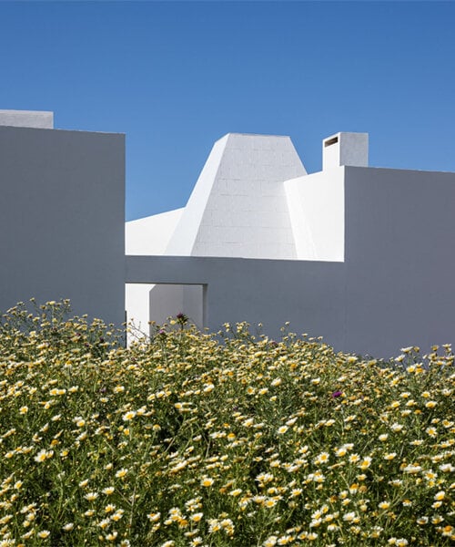 multifaceted 'house with two wings' by sol89 embraces southern spain's complex terrain