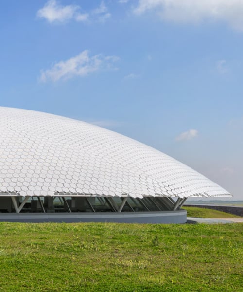 jean nouvel's university building in cyprus is an 'earthwork' clad with colored fabric