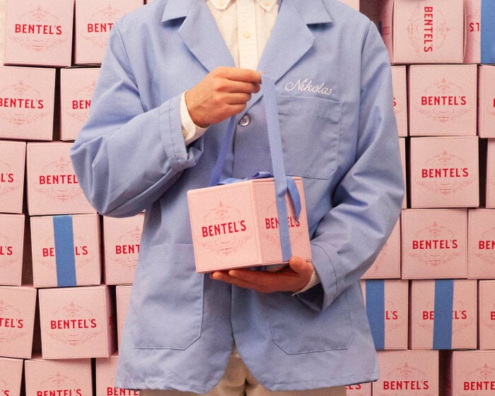 nik bentel turns wes anderson's pastry box from grand budapest hotel into pink leather bag