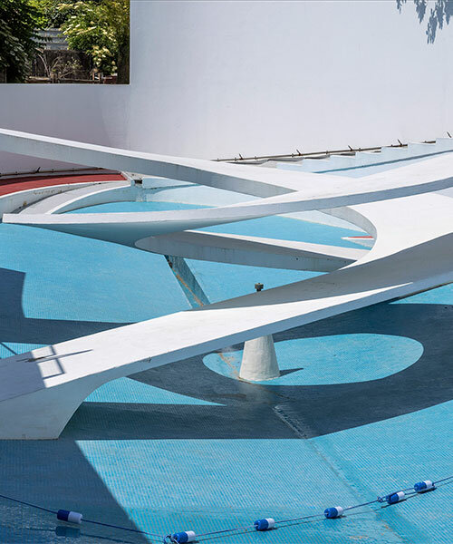 danica o. kus captures interwoven spiral ramps of modernist penguin pool at london zoo