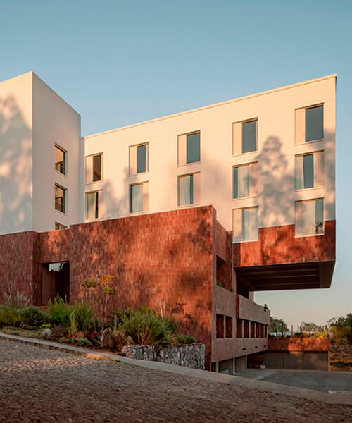 vibrant stone tiles adorn PRODUCTORA + esrawe studio's hotel in mexico